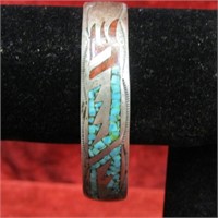 Turquoise coral silver Navajo singed bracelet.