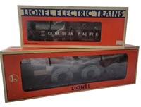 TWO LIONEL TRAIN CARS IN BOXES