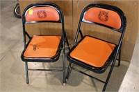 Pair of orange Huron Tiger padded chairs