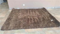 BROWN SHAG AREA RUG