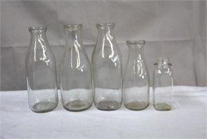 Five milk bottles, three 10.25, 8 & 6"H