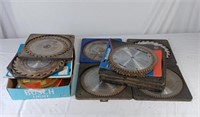 Collection of assorted saw blades, some still