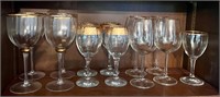 Assorted gold rimmed glasses