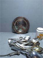 Plastic tub of silverware, anniversary plate, and