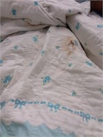 Blue and white small quilt w/ damage