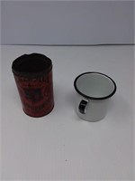 Enamelware cup and Calumet tin