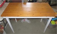 Wood table. Measures 31" h x 43" w x 23.5" d.