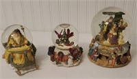 3 Christmas snow globes