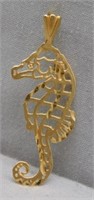 14K Yellow Gold sea horse pendant. Measures 1"