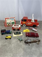 Vintage toy cars and trucks, some flying toys