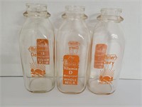 Glass Milk Bottles.