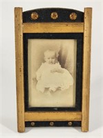 ANTIQUE BLACK & GOLD PICTURE FRAME W/ BABY IMAGE