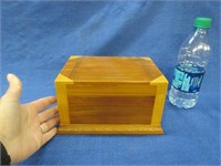 nice wooden dresser box with blue velet inside