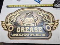Metal "Grease Monkey" sign.