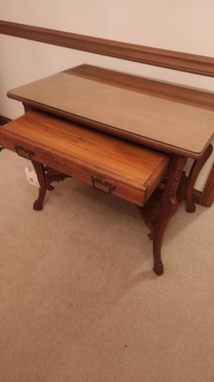 Antique oak desk with glass top. The overall
