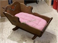 Beautiful wooden doll cradle with checked
