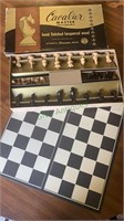 Vintage cavalier wood chess men with game board,