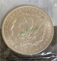 1885O US Morgan silver dollar marked