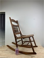 Medium sized wooden rocking chair