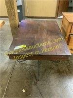 Antique wood table with wrought iron legs