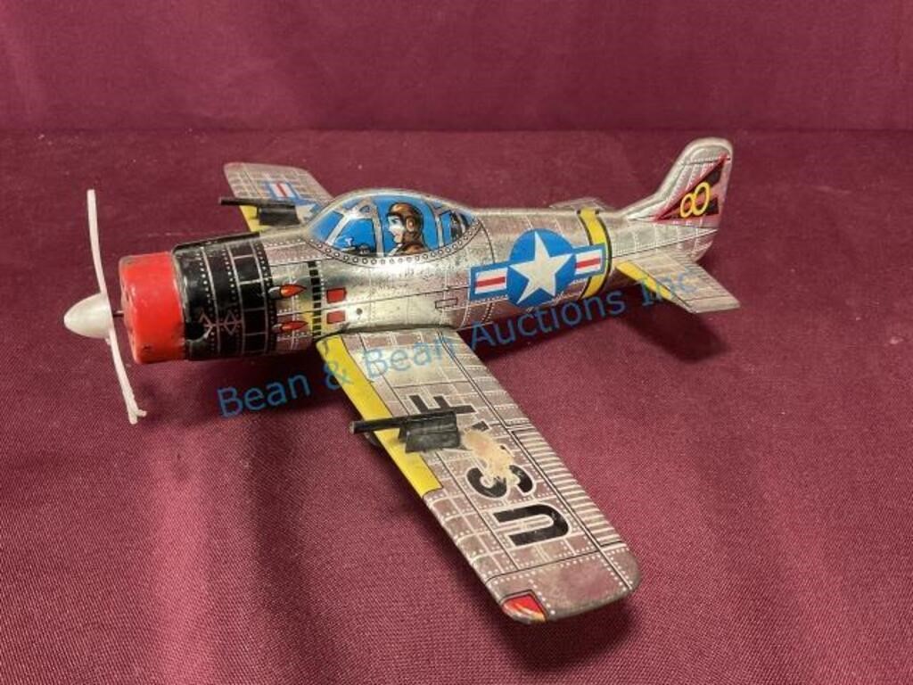 Vintage tin friction airplane toy