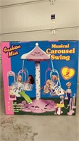 Fashion miss musical carousel swing appears to be