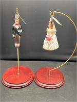 Merck family ornaments on stand bride groom