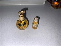 lot of two containers of gold flecks