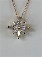 GOLD TONE CHAIN NECKLACE WITH CLEAR STONE FLOWER
