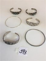 GROUP OF CUFF AND BANGLE BRACELETS SW DESIGN