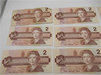 12 X CANADIAN 2 DOLLAR BILLS - 1986