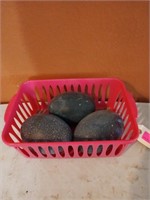 Three emu eggs in basket