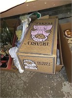 Box of sheets, dolls, and a nearly people doll