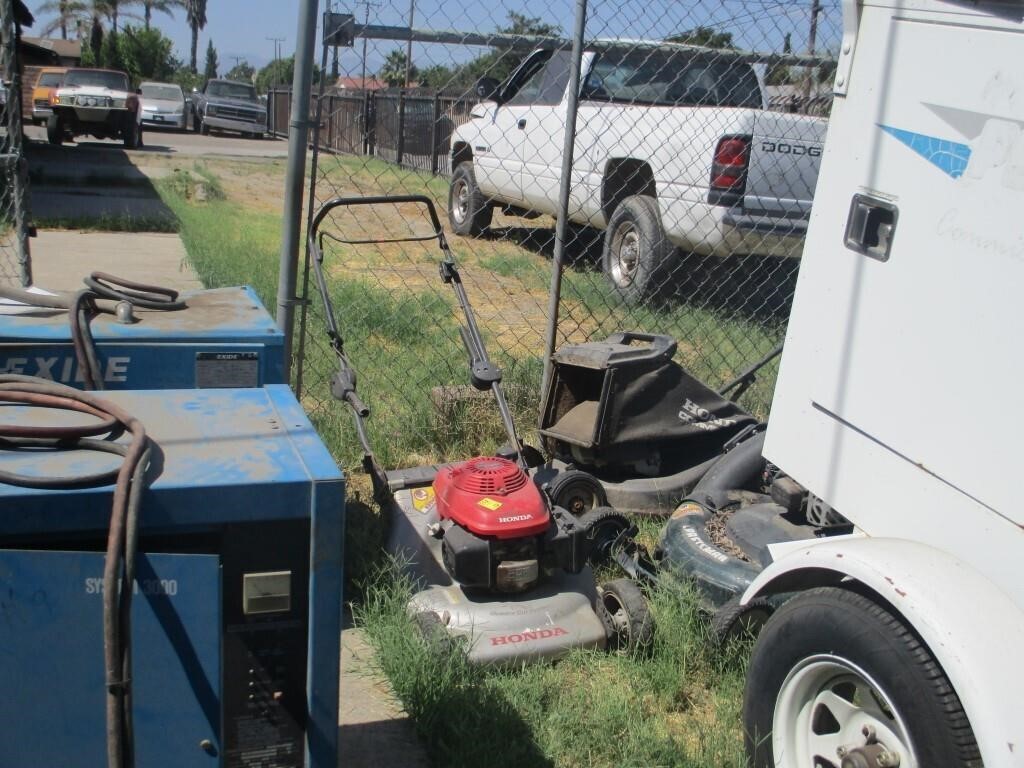 3 lawn mowers