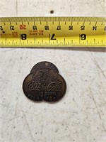 Coca Cola Betty says this is on the house coin