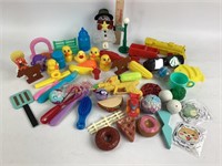 Kid toys, plastic food, ducks and miscellaneous