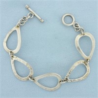 Hammered Finish Teardrop Link Bracelet in Sterling