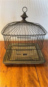 Antique 1870s brass birdcage, with a spring