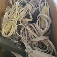 2 dozen extension cords & power bars  - H