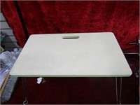 Folding lap table.