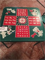 Child’s game table and two chairs