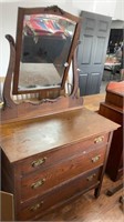 Antique dresser with mounted mirror, brass