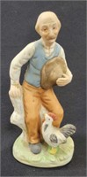 Vintage Figurine of Old Man with a Hat & Chicken