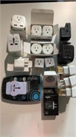 Assorted plugs, charger, adaptor
