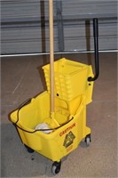 Rubbermaid Commercial mop bucket, wringer and mop;