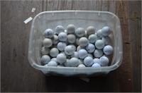Tub of Used Golf Balls