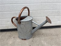 Galvanized watering can