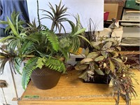 2 Potted artificial plants- see pictures