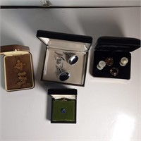 assorted cufflinks and other items