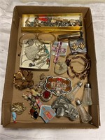 Box of miscellaneous jewelry and shakers